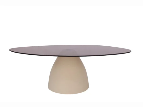 Trendy beige coffee table with glass. This table features an organic round glass top and beige base.