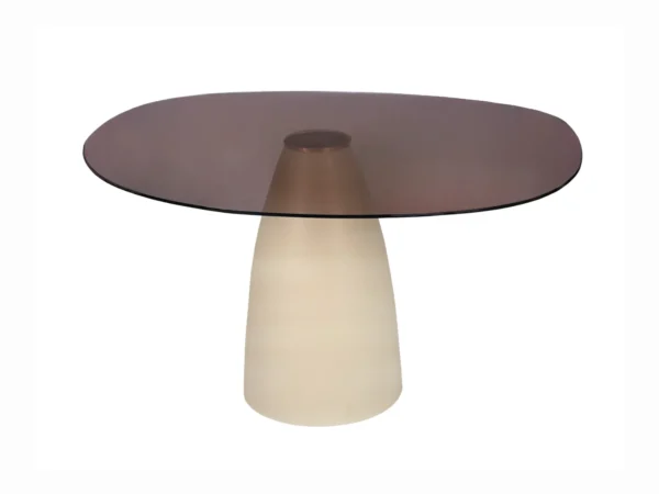 Beige round dining table with glass top. This table features an organic round glass top and timeless design.