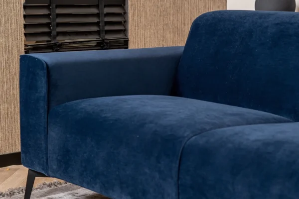 Sustainable, contemporary, and comfortable sofa in velvet with rounded elements and black metal base - TEAK2 furniture store.