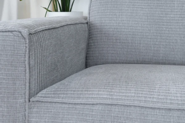 Sustainable, comfortable, and contemporary sofa in ribbed fabric with black metal base. Ribbed fabric sofa in recycled polyester, 3-seater sofa - TEAK2.