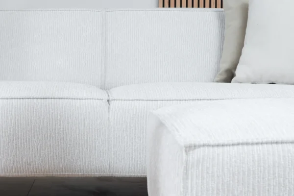 Sustainable, comfortable, and contemporary sofa in ribbed fabric with black metal base. Ribbed fabric sofa in recycled polyester, 3-seater sofa - TEAK2.