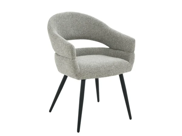 Moderne armstoel met een stijlvolle uitstraling. Deze eetkamerstoel is uitgevoerd met een modern design en open design rugleuning.