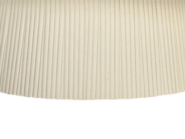 Table basse beige au look chic et élégant. Cette table tendance est dotée d'un plateau arrondi, d'un design branché et d'un élégant pied fuselé.