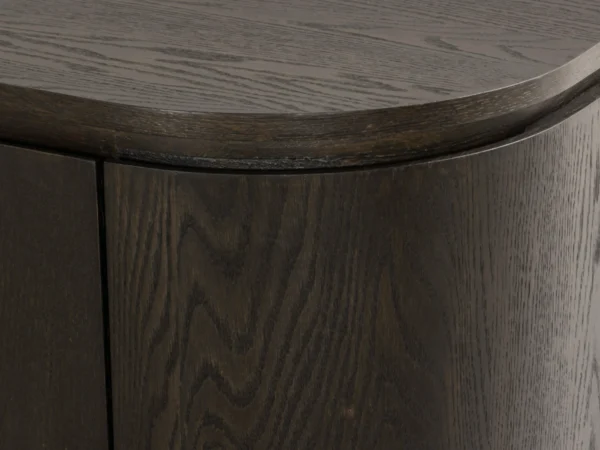 Trendy dark brown sideboard with a refined, oak look. Elegant, rounded lines and oak look in dark brown colour.